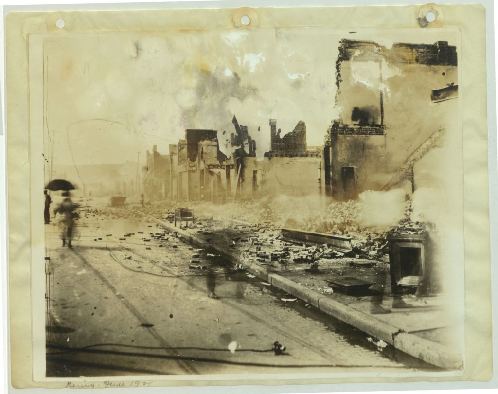 view of a street w/burned out/destroyed buildings