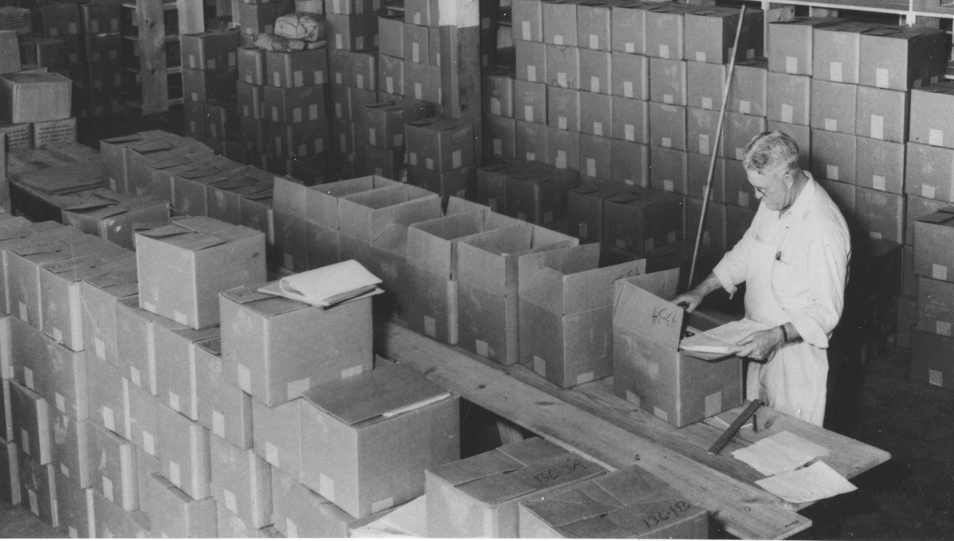 64-na-1-285-inspecting-records-in-alexandria-virginia-frc-aug-29-1952-cropped