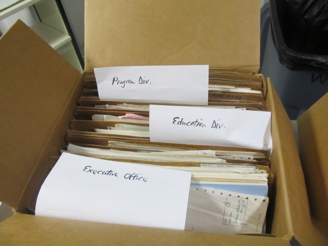 Records from different offices in a box.jpg