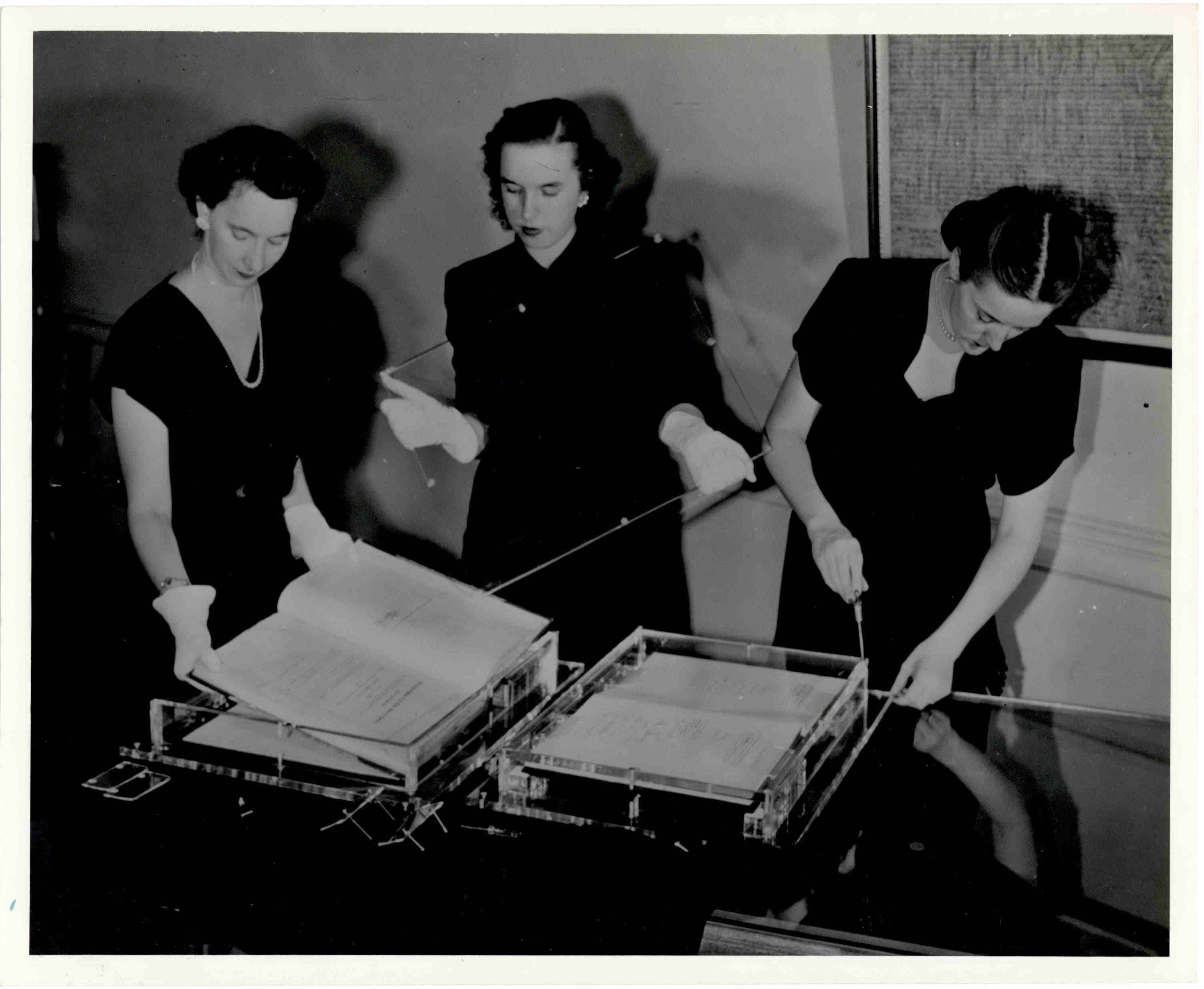 National Archives personnel prepare items for exhibit