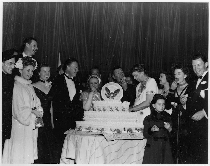 Eleanor Roosevelt at Franklin D. Roosevelt's birthday celebration with Myrna Loy, others