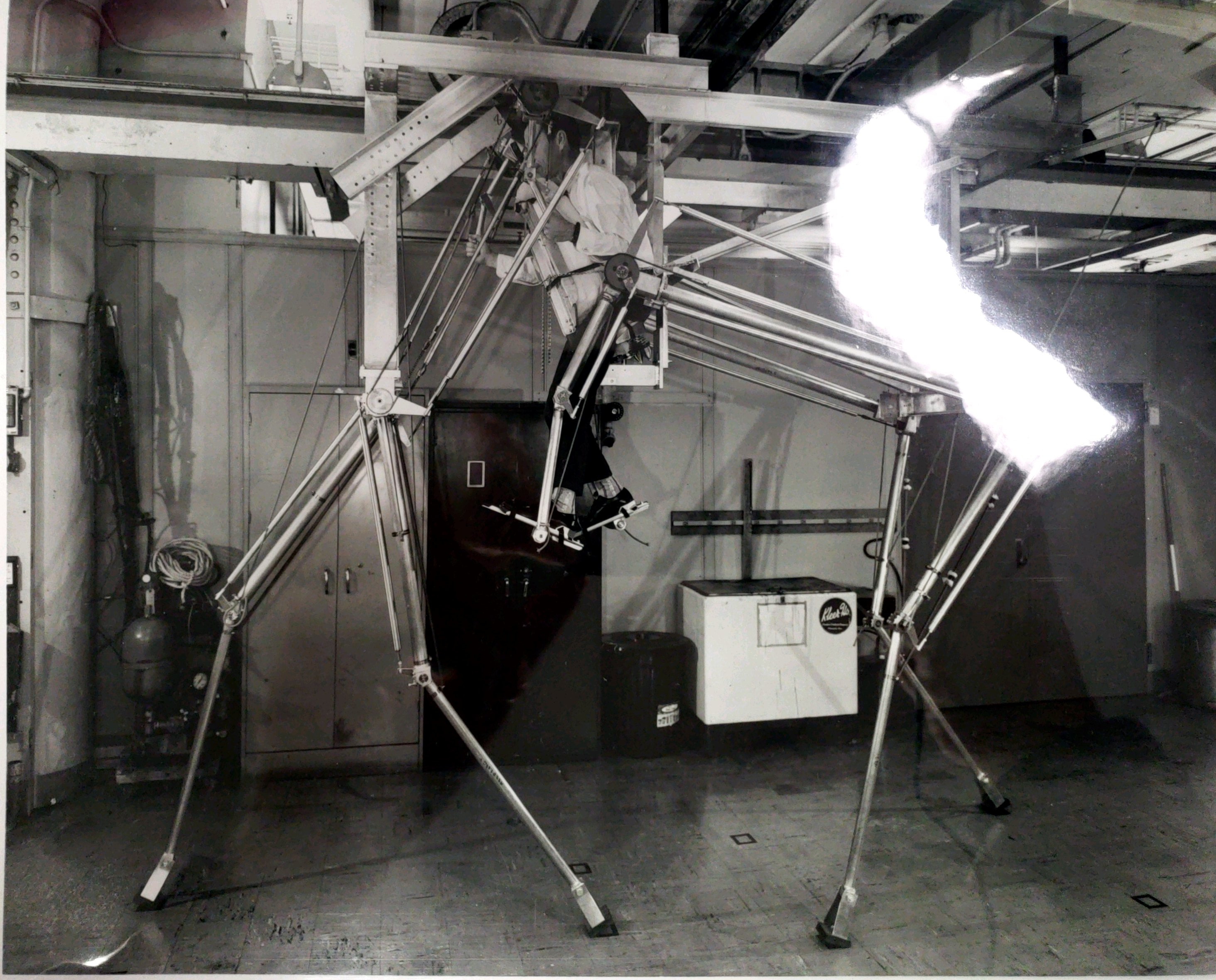 photograph of a man in a quadruped machine