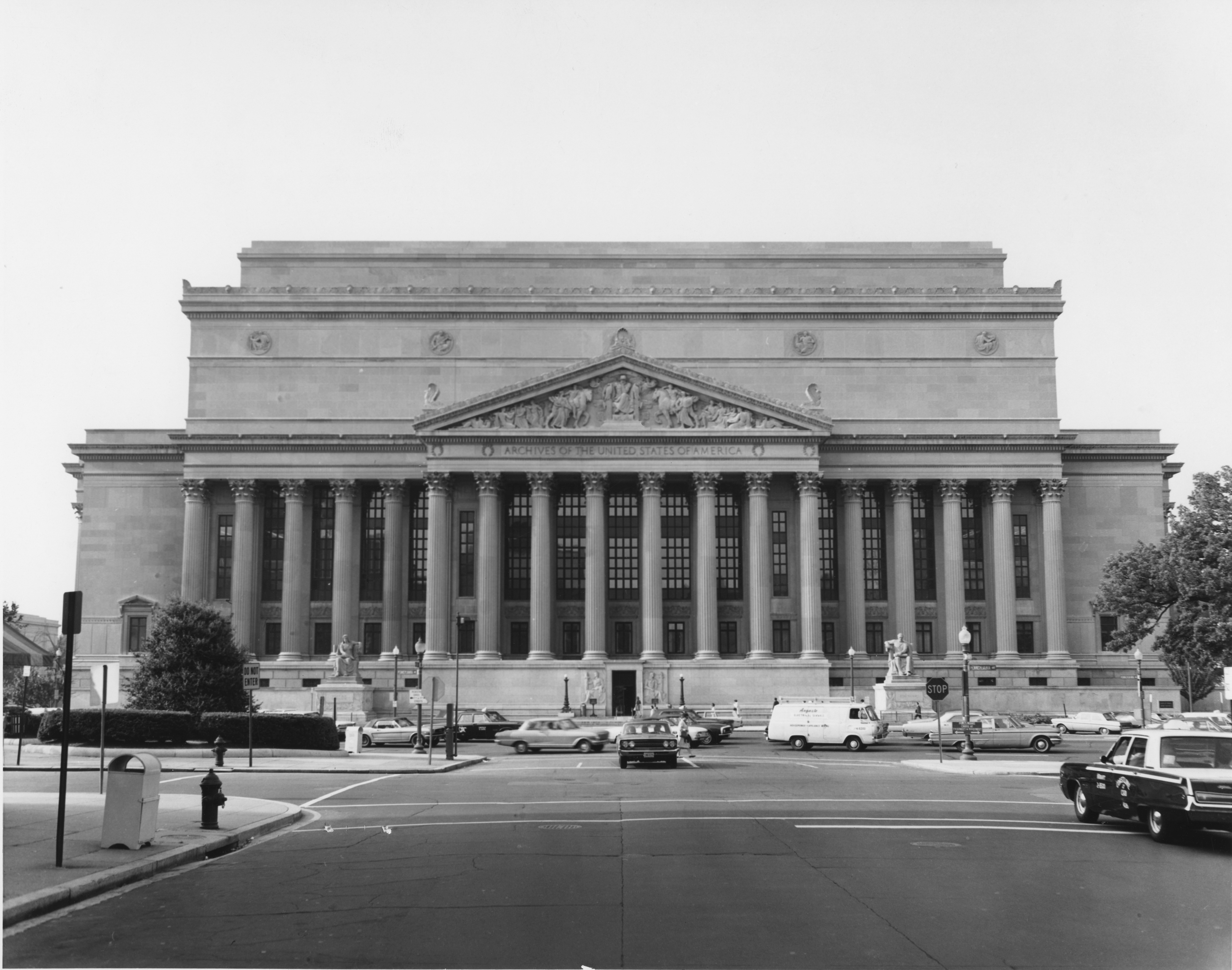 street view of the National Archives building showing traffic in front of it.